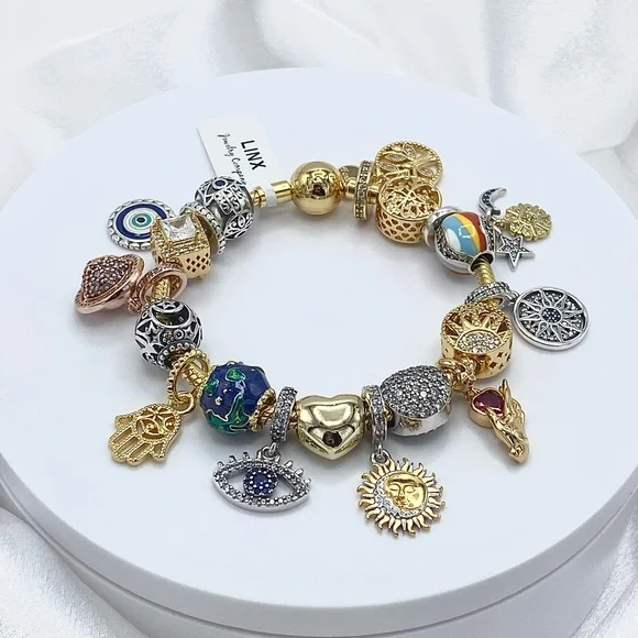 Linx Gold Snake Chain Bracelet with Universe Hamsa and Evil Eye Themed Charms